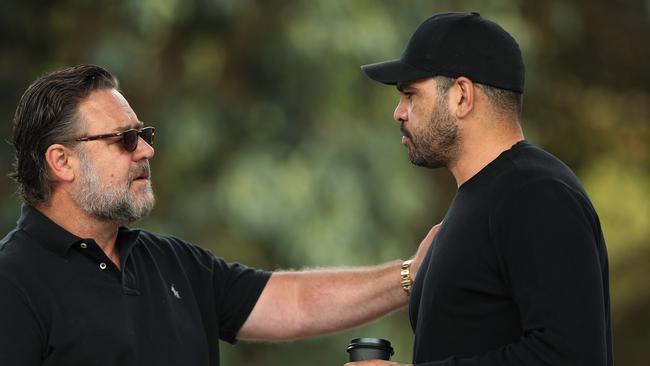 Russell Crowe with Greg Inglis at Redfern Oval. Picture: Brett Costello