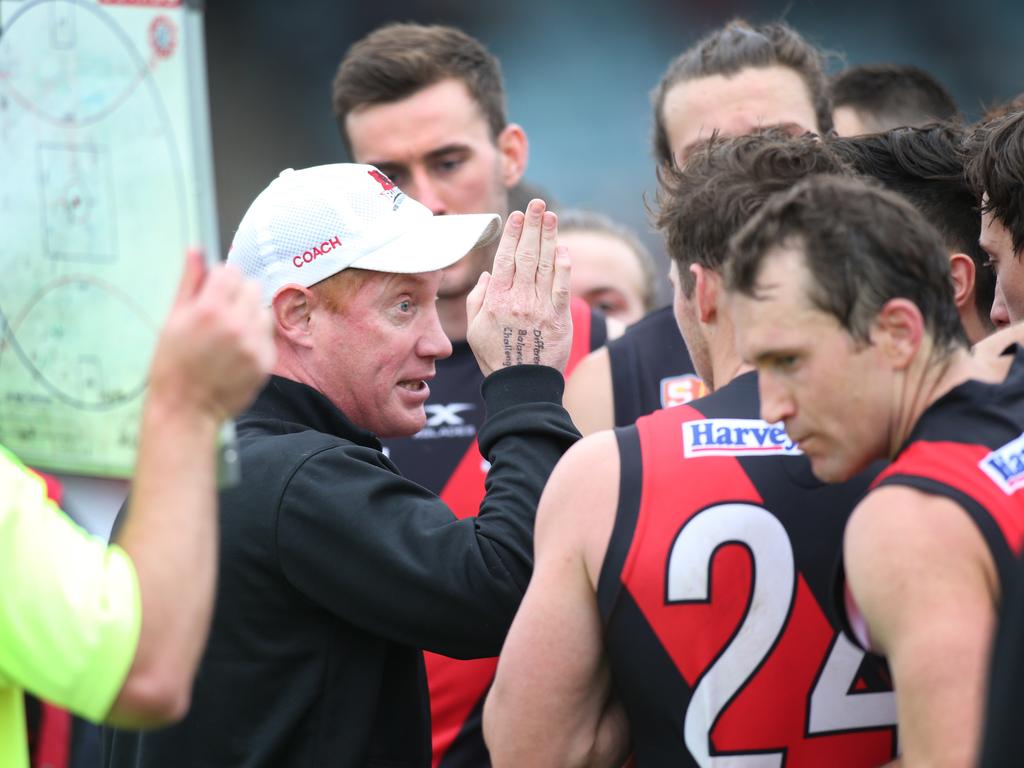 SANFL match between Port Adelaide and West Adelaide at Alberton Oval. 20 May 2018. West Coach Gavin Colville addresses his players at three quarter time. (AAP Image/Dean Martin)