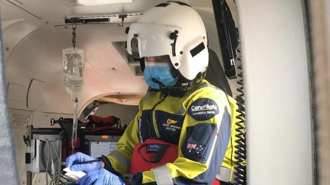 A specialist doctor on-board the CareFlight helicopter called out to fly a girl, 3, with severe burns after falling into a fire pit at Avalon Beach, to the Children's Hospital, Westmead. Picture: CareFlight