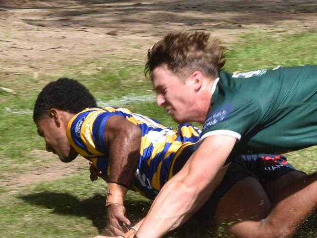Kamisese Tuqalo scores despite the efforts of Max Tanner. Picture: Sean Teuma. SRU Premiership 1st Colts Round 2 - Sydney University vs Randwick at St Andrews College, 12 April 2025