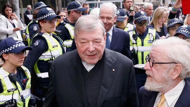 Cardinal George Pell leaves the Melbourne Magistrates' Court during his child over child abuse charges. Picture: Getty Images.