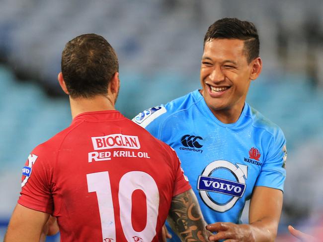 Happier times: Israel Folau (R) and Quade Cooper share a moment after a match.