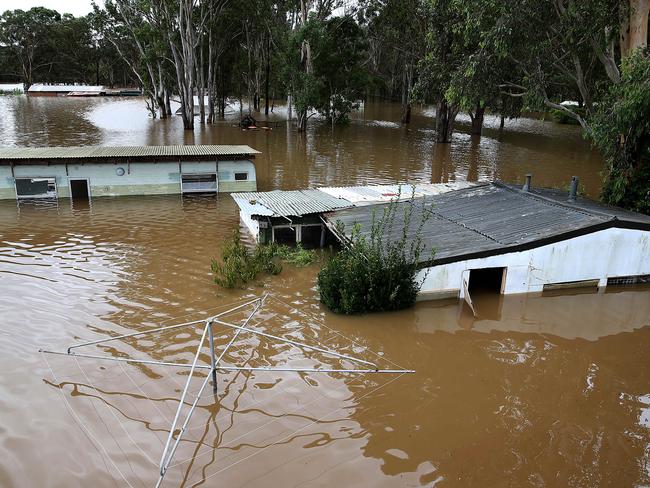 Oakville sheds and houses under water on the flooded Hawkesbury river near Windsor. Picture: Jane Dempster/The Australian