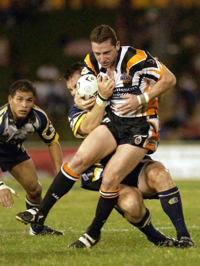 Former NRL player and now media man Joel Caine is sticking with his Wests Tigers through the tough times. Picture: AAP