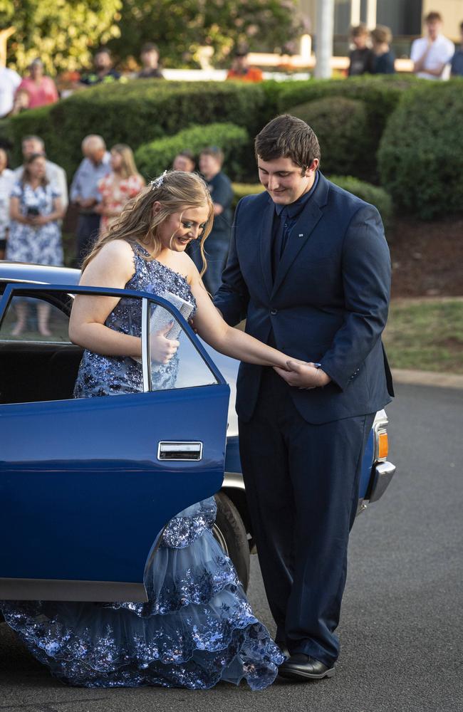 Graduates Kaylee Balderson and Thomas Fagan arrive at Mary MacKillop Catholic College formal at Highfields Cultural Centre, Thursday, November 14, 2024. Picture: Kevin Farmer