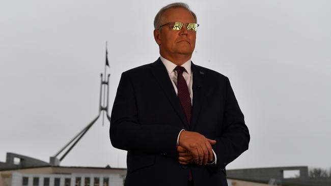 Scott Morrison in the forecourt lawn at Parliament House on Wednesday. Picture: Getty Images