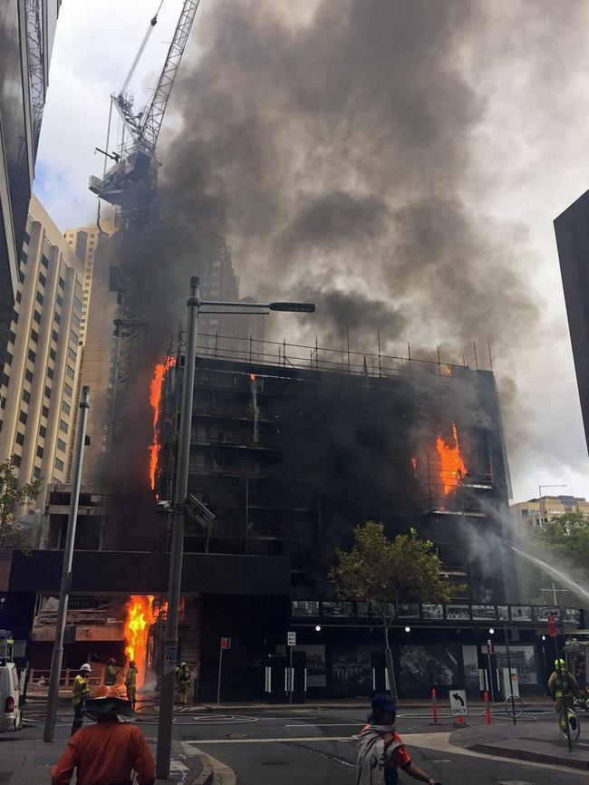 The building fire on the corner of Pitt and Alfred streets in Sydney. Picture: Lauren D'Arcy.