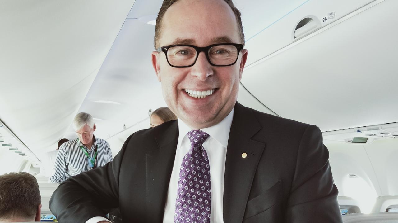 Qantas CEO Alan Joyce on board an A220, which the airline plans to use on international routes as well as regional flights. Picture: Steve Creedy