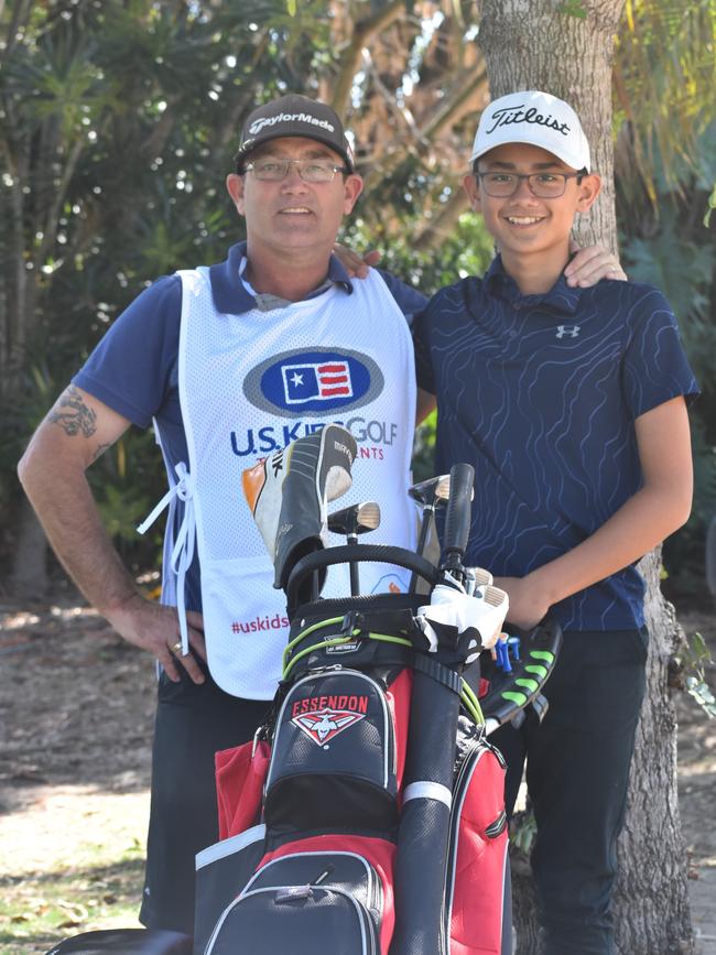 Hervey Bay's Colin Cotter with Matthew Cotter who is playing in the boys 12 years division of the US Kids Golf Foundation Australian Open at the Rockhampton Golf Club on September 27 and 28.