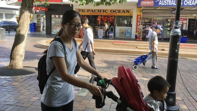 Mother-of-two Ging Hao said she’s not worried about walking on the streets but she has noticed there was “less crowds” than usual at that time of morning. Picture Nicole Pierre