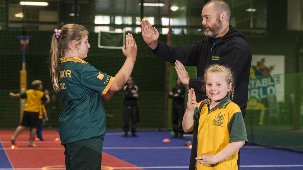 Chinese Martial Arts and Health Centre Australia SiFu Lester Walters conducts a kids’ kung fu session with Sierra Fox (left) and Tiarna Fox, Picture: Kevin Farmer