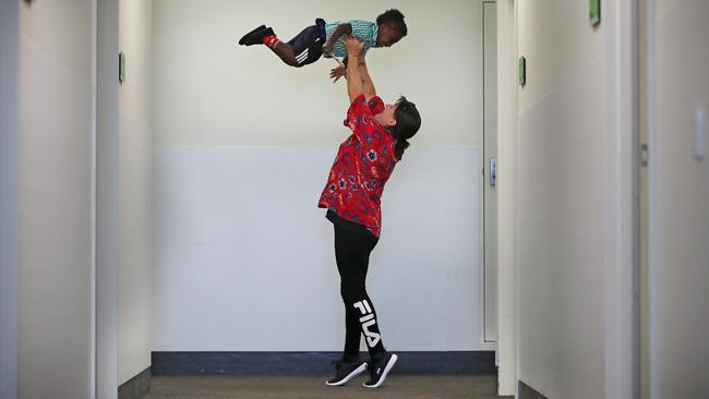 Children First staff member Tracey Burge with Jack after a hospital visit. Picture: Alex Coppel