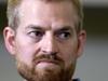 Ebola victim Dr. Kent Brantly looks on during a news conference after being released from Emory University Hospital, Thursday, Aug. 21, 2014, in Atlanta. Another American aid worker, Nancy Writebol, who was also infected with the Ebola virus, was released from the hospital Tuesday. (AP Photo/John Bazemore)