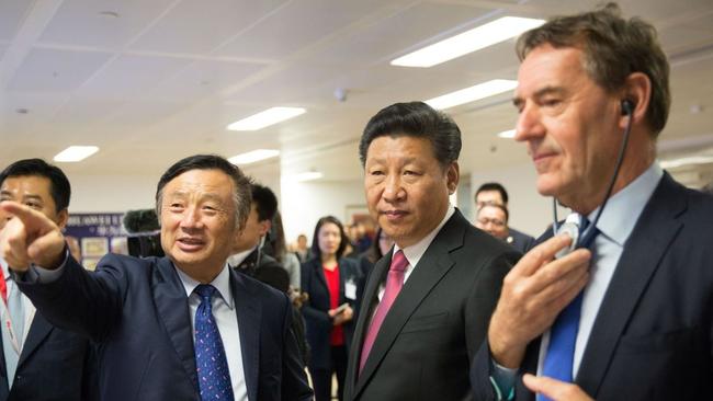 Huawei founder Ren Zhengfei with Chinese President Xi Jinping at the company’s London offices in 2015. Picture: Matthew Lloyd