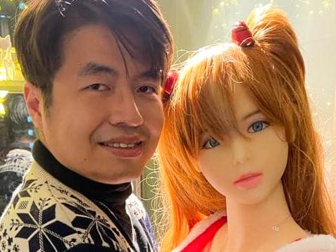 Hong Kong (photographs)Ã¢â¬Â¨Ã¢â¬Â¨NEWS COPY - WITH VIDEO AND PICTURESÃ¢â¬Â¨Ã¢â¬Â¨A Hong Kong man says he is engaged to a silicone sex doll - even giving her expensive gifts such as an iPhone 12.  Xie Tianrong, 36, lives with his parents and his unusual 'girlfriend' - a life-size doll manufactured in neighbouring China.   After making an online order and receiving the doll in October 2019, Xie devoted all of his attention to the sex toy which he fondly called 'Mochi.'  Xie said he found that he was attracted to realistic dolls ten years ago when he walked past a store in Causeway Bay, Hong Kong's energetic retail heart.  He said: 'A doll cost 80,000 yuan at that time, so I had to dispel my thoughts as I could not afford her.  'But in 2019, I found a silicone doll on the internet that was on sale and cost about 10,000 yuan so I ordered it.'  Xie said that he was 'engaged' to Mochi earlier this month in a ceremony attended by friends and family.   He added he had never 'violated' Mochi even once and doesn't try to kiss her, as he's afriad the saliva's acidity might damage the doll's sensitive skin.  Every night, Mochi sits on a chair by his bed while he sleeps and he bathes her with a damp cloth before applying talcum powder.  Xie said: 'I respect Mochi and only want her as a companion. I have had human girlfriends before but I am only attracted to dolls now. I have never had sex with her.'  The doll fanatic claimed real girlfriends always ask him for something, but Mochi demands nothing from him so 'she is easier to date'.  He said: 'When me and my previous girlfriend were together, she was always staring at her phone, but with Mochi it's different. She will concentrate and give me all her attention.'  Xie buys expensive gifts such as phones and pretty clothes for Mochi so he can dress her up before taking cute couple pictures.  The doll now owns more than 20 sets of expensive clothing and 10 pairs of shoes.  During festivals, the strange couple will do photoshoots at home weari  Picture: Viralpress/Australscope