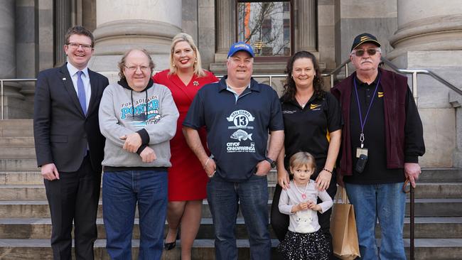 Labor MPs Katrine Hildyard and Chris Picton with boaties from O'Sullivan Beach calling for the boat ramp to be upgraded.
