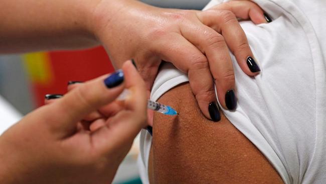 Polling conducted by Crosby Textor in Australia, the United States, Britain, Hong Kong, India and the United Arab Emirates found 72 per cent of Australians were willing to take the vaccine. Picture: AFP