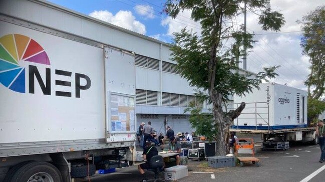 Broadcast crews waiting outside Browne Park in Rockhampton.