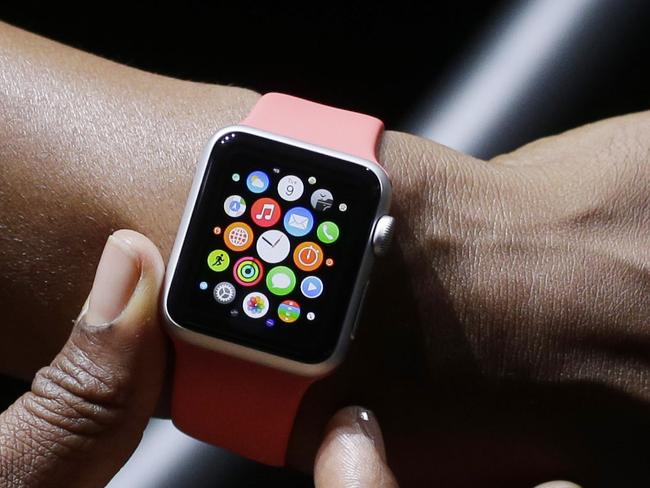 A model shows the new Apple Watch during Apple's announcement of new products on Tuesday, Sept. 9, 2014, in Cupertino, Calif. (AP Photo/Marcio Jose Sanchez)