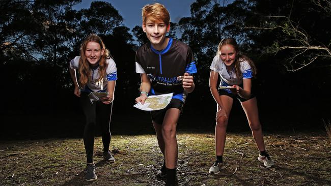 Members of local orienteering club Australopers, Zali McComb, 16, Jett McComb, 14 and Julia Powell-Davies, 16 have been taking part in new courses and challenges during the COVID-19 pandemic. Picture: Zak Simmonds