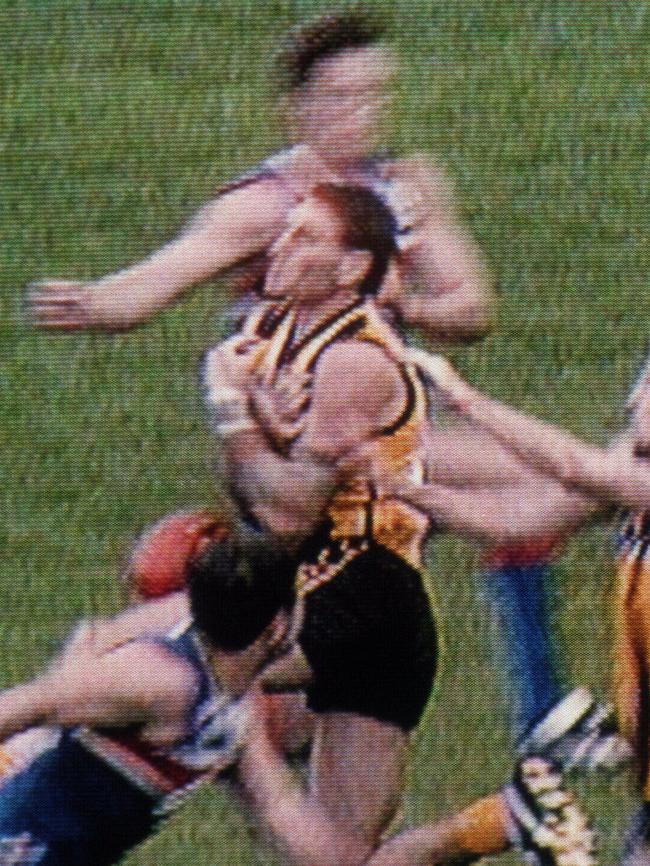 Chris Grant’s hit on Nick Holland that cost him the 1997 Brownlow Medal. Picture: Courtesy Channel Seven.