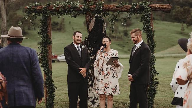 Adam and Rupert with their celebrant Eavie Teasdale on their wedding day. Photo: Tessa Cox Photography.