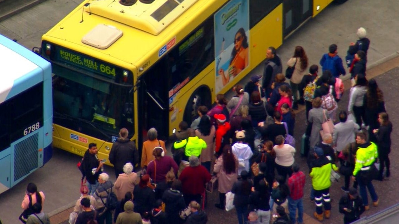 Commuters, who normally use trains, scramble for replacement bus services. Picture: Nine News.