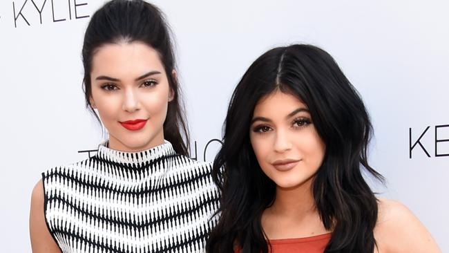 Independent ... Kylie Jenner, right, with her sister Kendall, has been supporting herself since she was 14. Picture: Getty Images