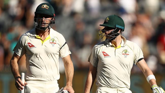 MELBOURNE, AUSTRALIA - DECEMBER 26:  Shaun Marsh and Steve Smith of Australia walk from tge ground at stumps during day one of the Fourth Test Match in the 2017/18 Ashes series between Australia and England at Melbourne Cricket Ground on December 26, 2017 in Melbourne, Australia.  (Photo by Ryan Pierse/Getty Images)