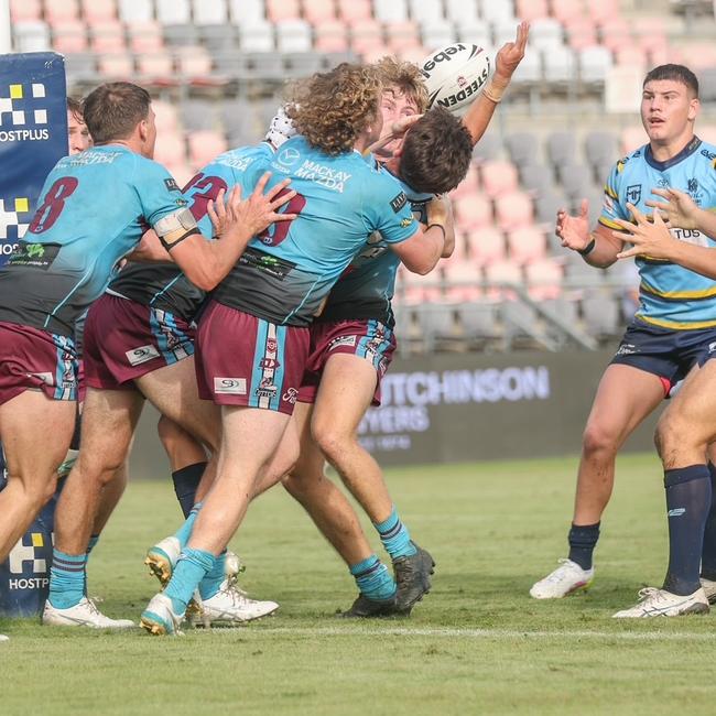 Typical Mackay defence bends back a Norths player.
