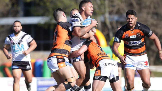 Jaydn Su'a attracts attention playing for Souths Logan last year.