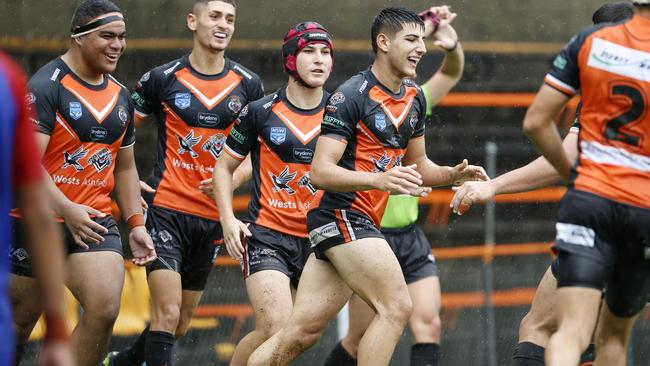 Tigers fullback Cameron Kanaan after scoring a try during the Balmain Tigers v Newcastle Knights NSWRL Junior Rep Harold Matts Game at Leichhardt Ova. Picture: Tim Hunter.