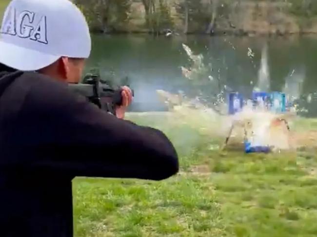 Kid Rock shooting at beer. Because, reasons.