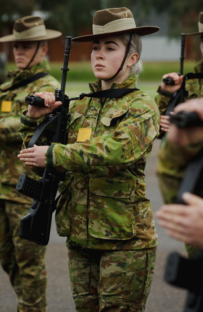 An Australian Army recruit from 1st Recruit Training Battalion Kapooka presents arms during drill practice at Blamey Barracks Kapooka, NSW, where they are taught mental and physical resilience, military drill, field craft, navigation, teamwork, confidence and marksmanship. Picture: LAC Adam Abela