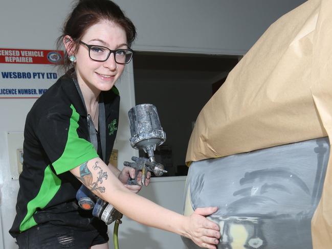 . Megan Riley originally planned to go to art school but then changed her mind and is now an automotive refinishing technician at Pymble Accident Repair Centre. Photo: Bob Barker.