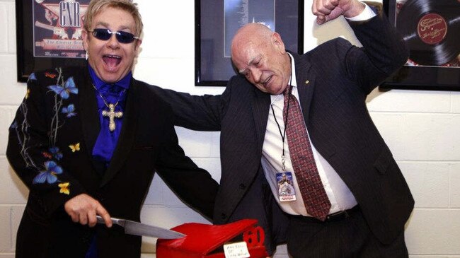 Elton John and promoter Michael Chugg celebrate their 60th birthdays in 2007.