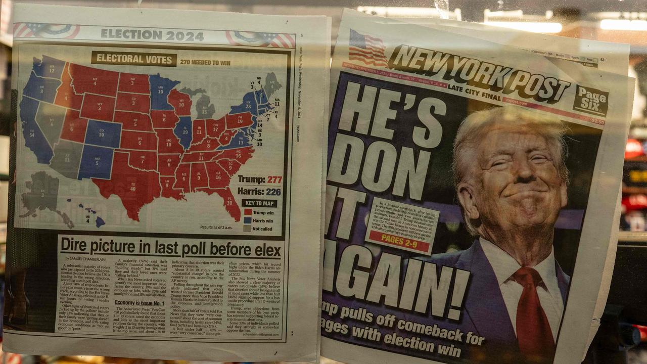 The New York Post is displayed in the window of a newsstand inside of Trump Tower in New York City, November 6. Donald Trump won a sweeping victory Wednesday in the US presidential election, defeating Kamala Harris to complete an astonishing political comeback that sent shockwaves around the world. Picture: David Dee Delgado/AFP