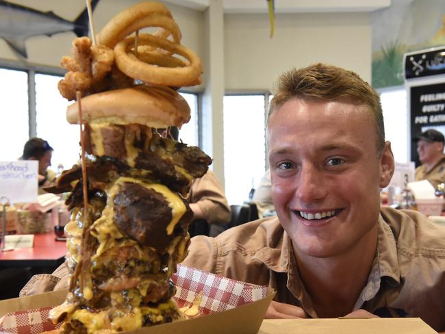 Isaac Harding-Davis attempts to devour District North Kitchen's 1.5kg burger called 'You Sure You Ready For This'