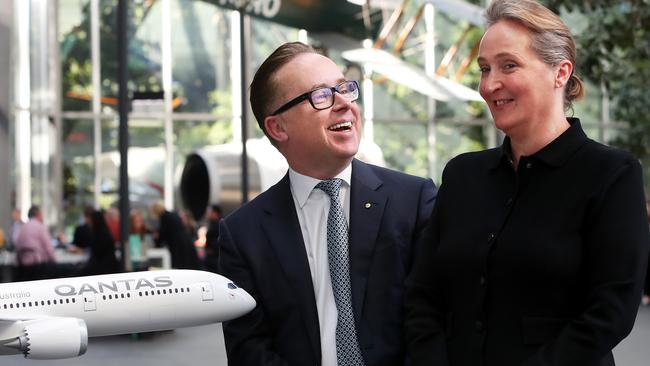 Alan Joyce, chief executive officer of Qantas Airways Ltd., left, and Vanessa Hudson, chief executive officer-designate of Qantas Airways Ltd., pose for photographs during a news conference in Sydney, Australia, on Thursday, Aug. 24, 2023. Qantas ordered dozens more long-range Boeing Co. and Airbus SE jets in a bid to keep pace with a post-pandemic travel boom that's delivering record profits. Photographer: Lisa Maree Williams/Bloomberg