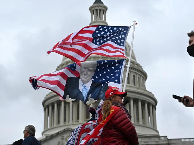 Supporters of US President Donald Trump gather at the US Capitol on January 5, 2021, in Washington, DC, as they protest the upcoming electoral college certification on January 6 of Joe Biden as President. (Photo by Brendan Smialowski / AFP)