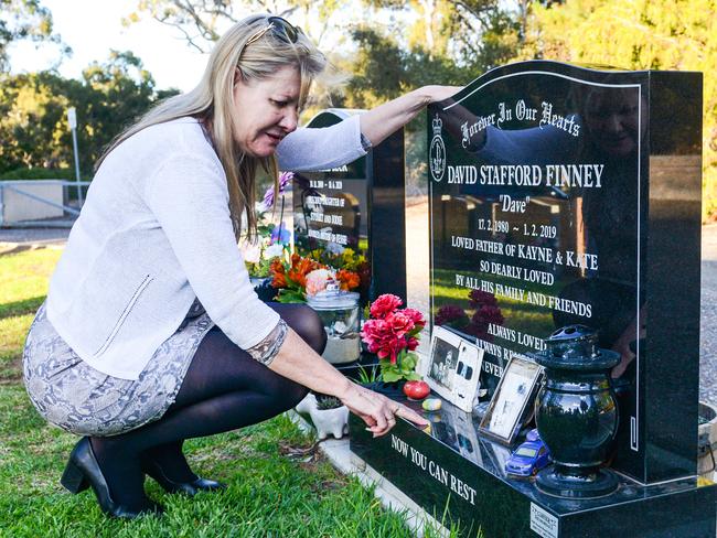 ADELAIDE, AUSTRALIA - NewsWire Photos APRIL 19, 2021: Julie-Ann Finney visits the grave of her son Dave at the Golden Grove Cemetery after the Prime Minister announced a Royal Commission into veteran suicides. Picture: NCA NewsWire / Brenton Edwards