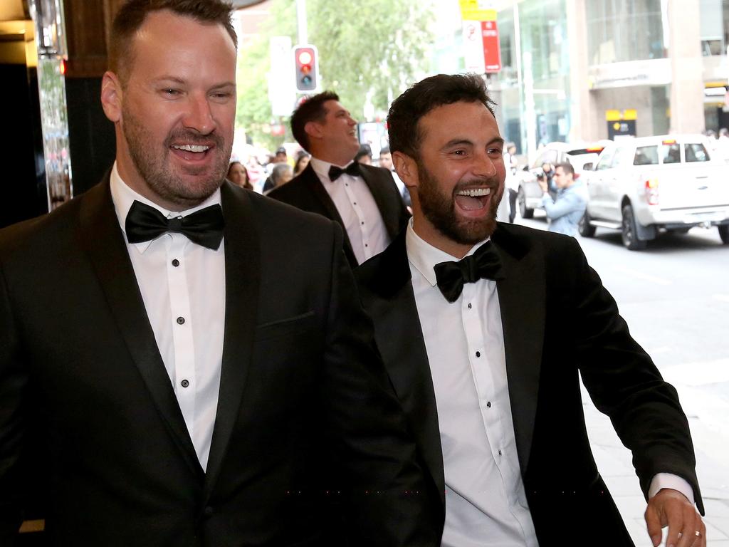 Cameron Merchant (right) pictured as he gets on a bus outside the QT Hotel to his own wedding. Picture by Damian Shaw