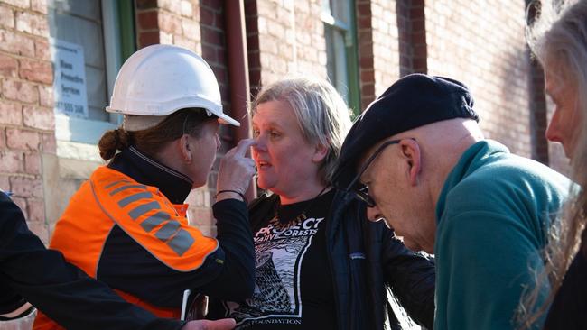 Bob Brown Foundation campaign manager Jenny Weber and a pro-forestry protester confront each other at a movie screening in 2023. Picture: Bob Brown Foundation