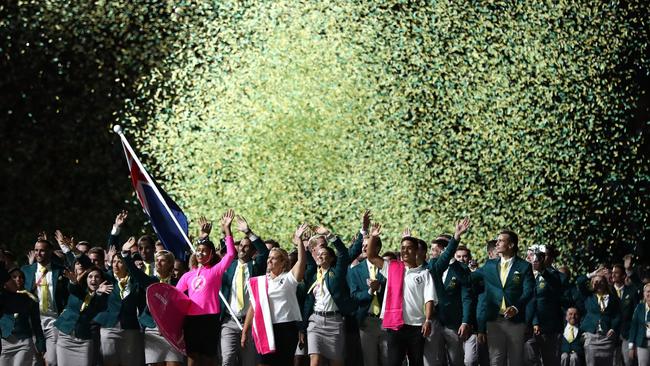 GOLD COAST, AUSTRALIA - APRIL 04: Mark Knowles, flag bearer of Australia arrives with the Australia team during the Opening Ceremony for the Gold Coast 2018 Commonwealth Games at Carrara Stadium on April 4, 2018 on the Gold Coast, Australia. (Photo by Ryan Pierse/Getty Images)