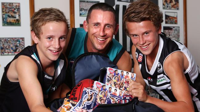 IN THE NAME OF THE FATHER: Inaugural Power club champion Darren Mead with his sons, Jackson (left), then 12, and Mitchell, then 14, in 2014. Picture: SARAH REED.