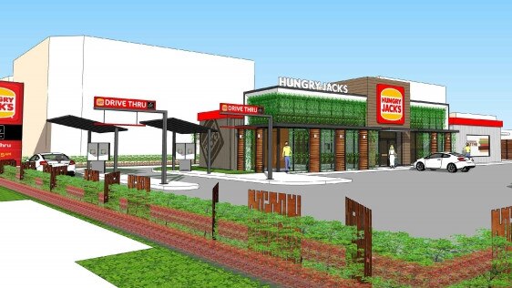 An artist’s impression of the Hungry Jack’s restaurant in Brookvale, depicting signage, a drive-thru area and parking lot.