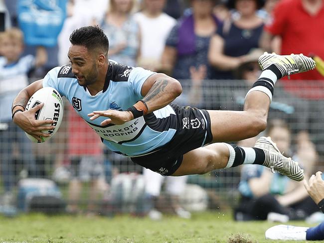 SYDNEY, AUSTRALIA - MARCH 23: Briton Nikora of the Sharks scores a try during the round two NRL match between the Cronulla Sharks and the Gold Coast Titans at Shark Park on March 23, 2019 in Sydney, Australia. (Photo by Ryan Pierse/Getty Images)