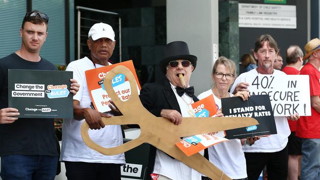 Union members Rolly Cummins (left), Wayne Costello, Mitchell Haginikitas, Dianne Power and Steve Blacklow protest cuts in penalty rates in front of a polling centre on Grafton St. Picture: Brendan Radke