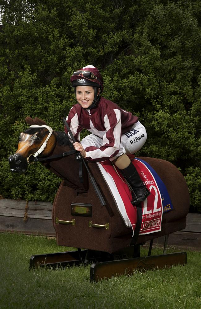 You beauty ... Payne on her Equicizer which she uses to train at home. Picture: Andrew Tauber