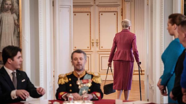 After signing the declaration of abdication Queen Margrethe II of Denmark leaves the seat at the head of the table to her son King Frederik X of Denmark and Prince Christian of Denmark. Picture: AFP